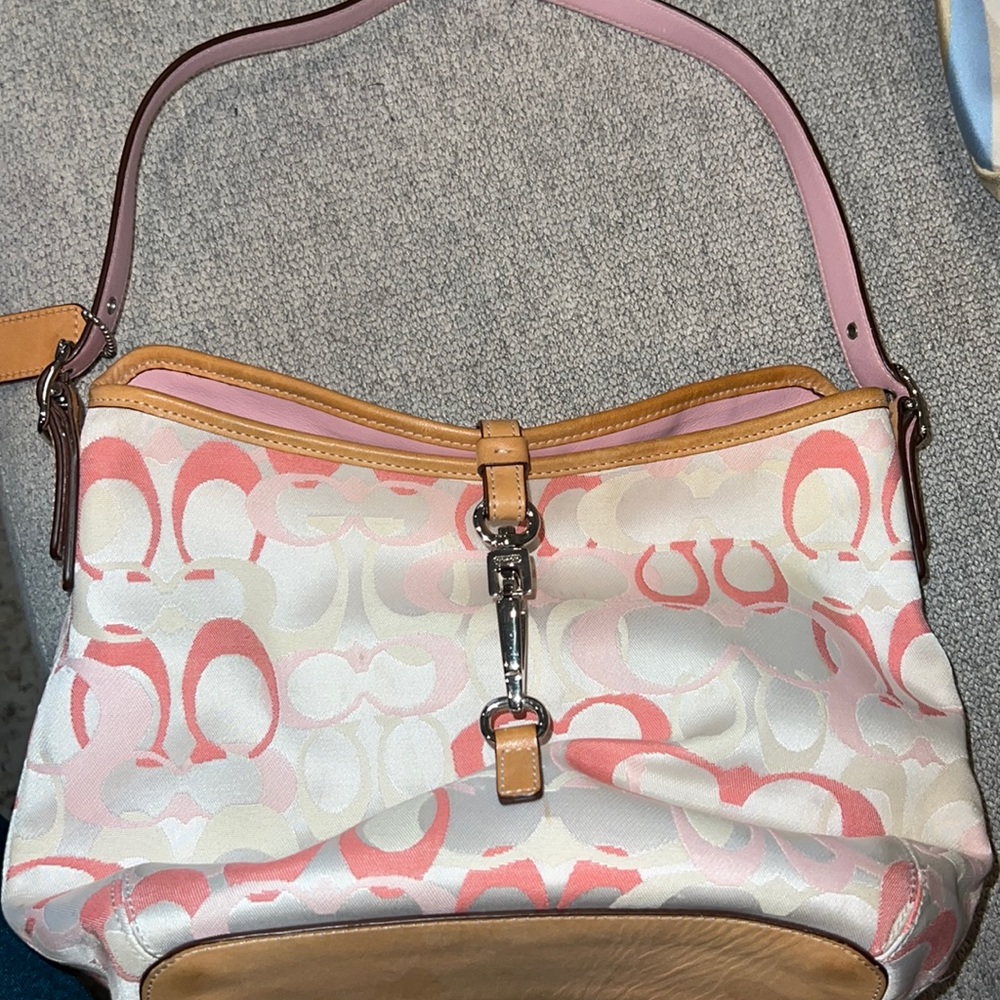 Pink Coach Signature Purse and dust cover. Gently used.